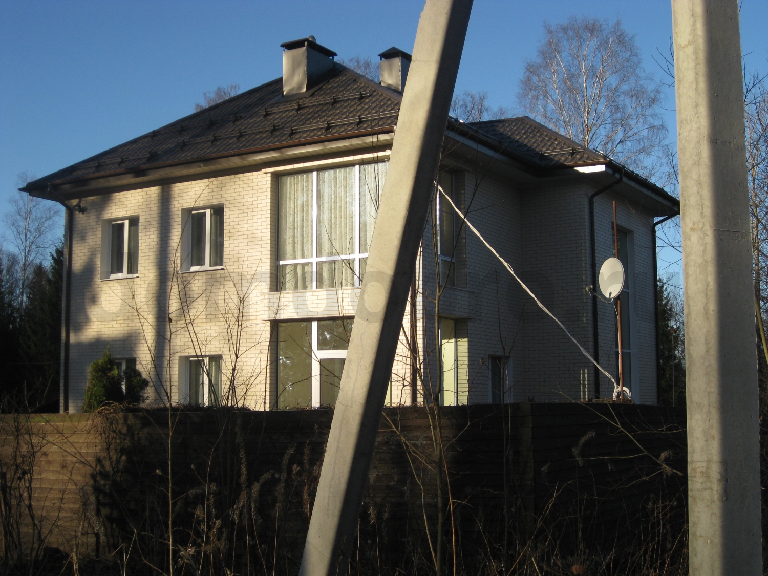 Частный двухэтажный дом из клинкерной фасадной плитки